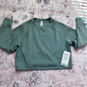 Lululemon Smooth Spacer Cropped Pullover *Graphic
Crater Blue- NWT - Size 6